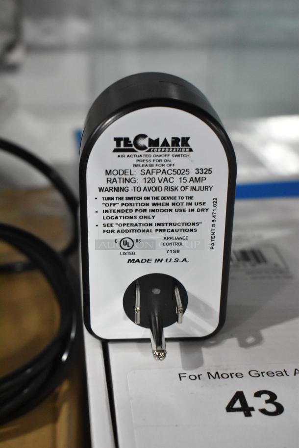 Tecmark Corporation air-actuated on/off switch, Model SAFPAC5025 3325, 120VAC 15A, UL listed, made in USA.