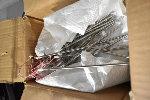 Box of brand new Avantco thermocouples, models QS-HD3300D, QS-HD3300B, QS-HD1800A, partially packed with wires.