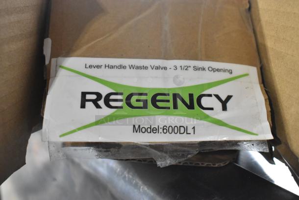 "Brand new Regency 600DL1 lever handle waste valve for 3 1/2" sink opening, scratch and dent condition, label visible."