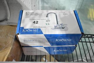 Brand new Krowne Silver Series 10-400L wall-mount faucets in original boxes, featuring 3 1/2" gooseneck nozzle.