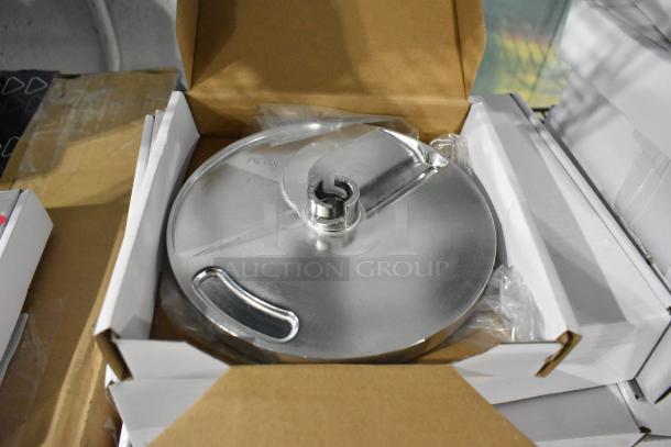 5 brand new AvaMix dicing grids in boxes, minor scratches. Includes slicing disc, marked "10 MM" for precision cuts.