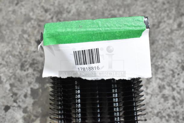 Brand new evaporator coil with minor scratches, featuring a green tape, barcode, and reference number 17818816.