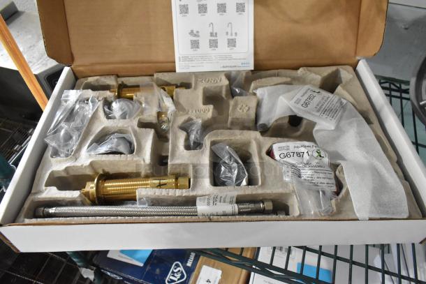 Brand new Zurn Elkay Z831B4-XL AquaSpec faucet in box, 5 3/8" gooseneck spout, ceramic cartridge, wrist handles, with labels.