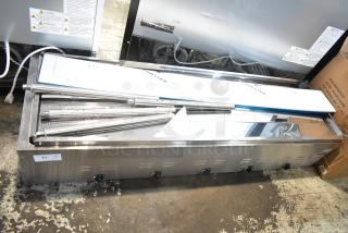 Brand new Avantco 177STE5S electric steam table, five pan open well with undershelf, 208/240V, 1 phase. Slight scratches.