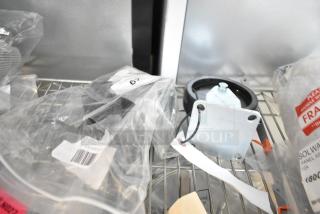 Two brand new Vulcan casters in original packaging, labeled as scratch and dent items. Includes tags and manufacturing details.