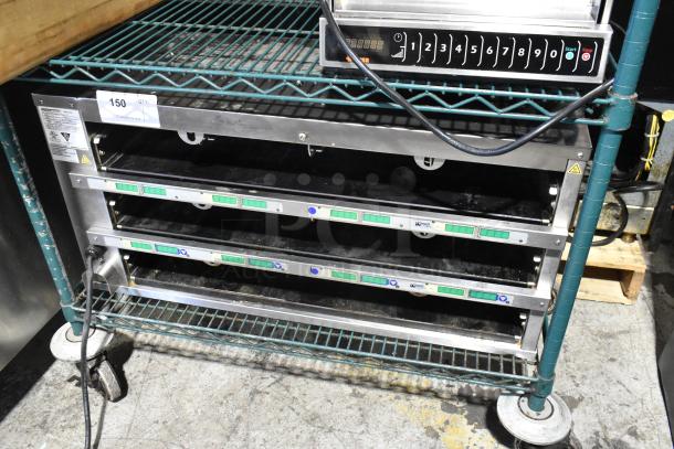 2023 Prince Castle EHB34A-2 countertop holding bin, 208-240V, 1 phase. Features multiple slots, digital controls, and stainless steel finish.