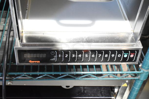 2022 Menumaster OC24HBK Commercial Microwave, 208/240V, 1 Phase. Features control panel and "THE HOPPER" label.