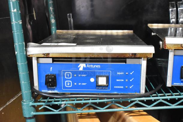 AJ Antunes ES-1200 commercial countertop egg steamer, 208-240V, 1 phase, with start/stop and timer buttons, visible wear.