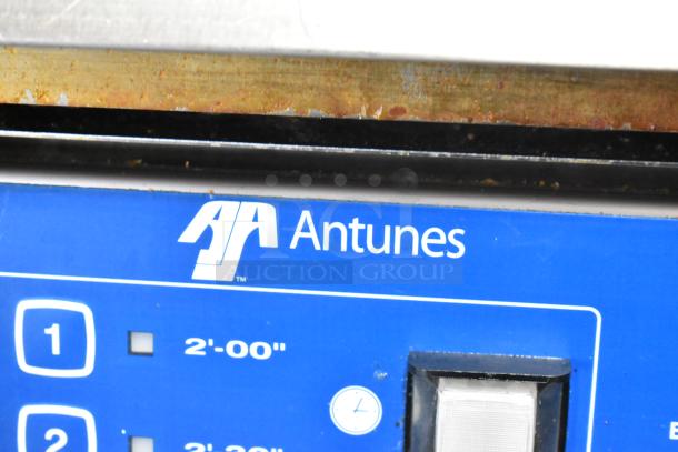 AJ Antunes ES-1200 egg steamer control panel with settings. Blue panel, timer buttons visible. Model in good condition.