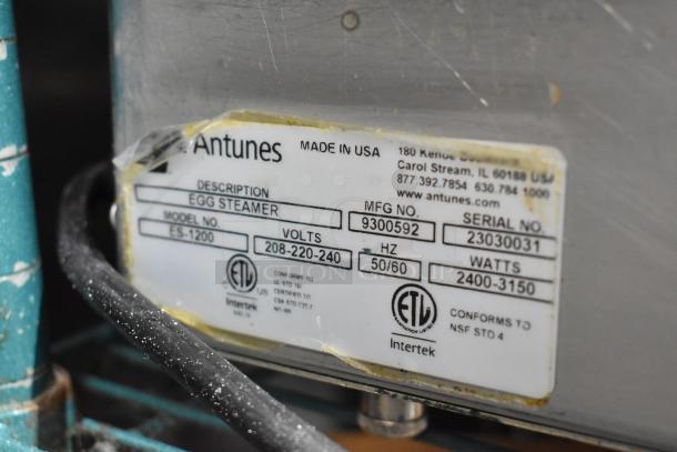 AJ Antunes ES-1200 Commercial Egg Steamer label, showing model, volts, hertz, watts, MFG and serial numbers. Made in USA.