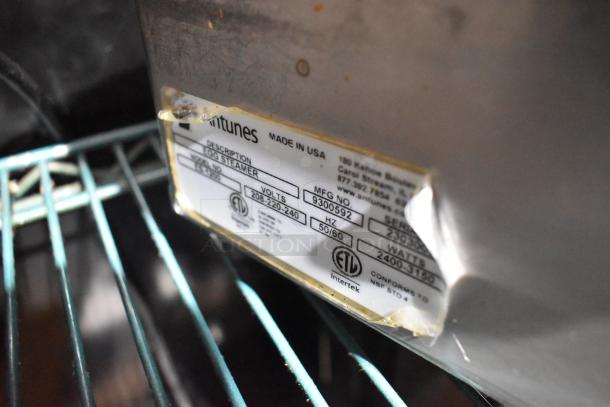 AJ Antunes ES-1200 Egg Steamer label close-up showing model, voltage, and certifications. Item in used condition.