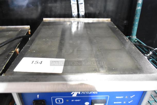 AJ Antunes ES-1200 Commercial Countertop Egg Steamer, blue control panel, model tag shown, 208-240V, used condition.