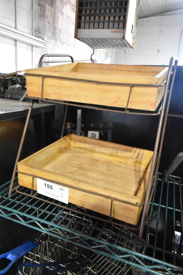 Countertop 2 Tier Merchandiser with wooden trays on metal frame, item tag "155," used condition.