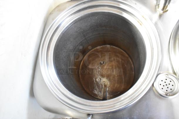 Curtis RU-600-80W Coffee Urn, stainless steel interior, for commercial use, 208/220 volts, showing inside condition.