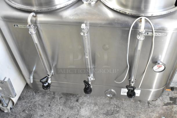 Curtis RU-600-80W commercial twin coffee urn, stainless steel, dual spigots, caution labels, 208/220V, used condition.
