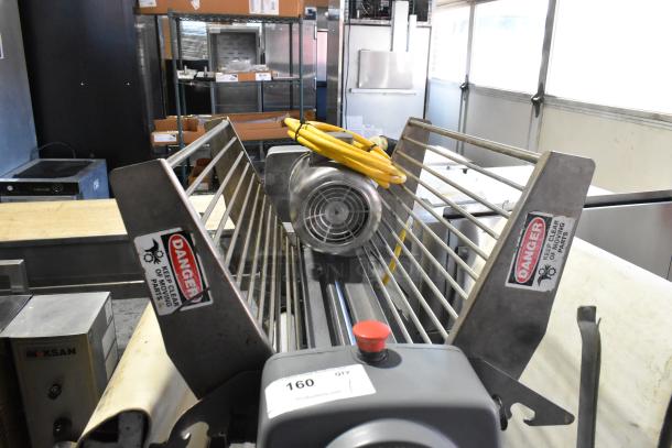 Rondo Seewer commercial dough sheeter, floor style, reversible; 208/250V, 1 phase. Features safety labels. Condition: used.