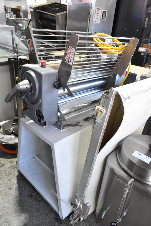 Rondo Seewer reversible dough sheeter, 208/250V, 1 phase, commercial floor style, visible condition wear, safety labels attached.