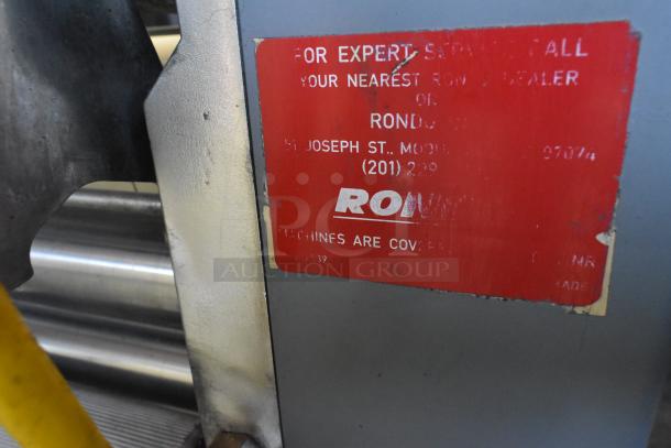 Rondo Seewer commercial dough sheeter, reversible, floor style. 208/250 volts, 1 phase. Red label indicates contact info.