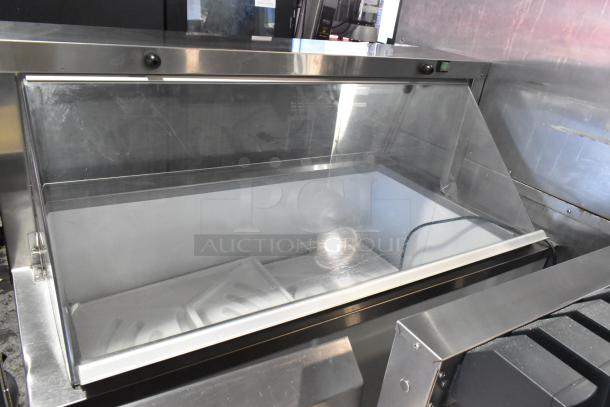Avantco 178CPW47HC commercial ice cream dipping cabinet, stainless steel, 115 volts, 1 phase, clear lid, excellent condition.