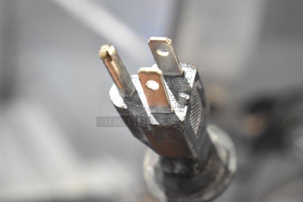 Close-up of a power plug for the Avantco 178CPW47HC Commercial Ice Cream Dipping Cabinet. 115 Volts, 1 Phase.