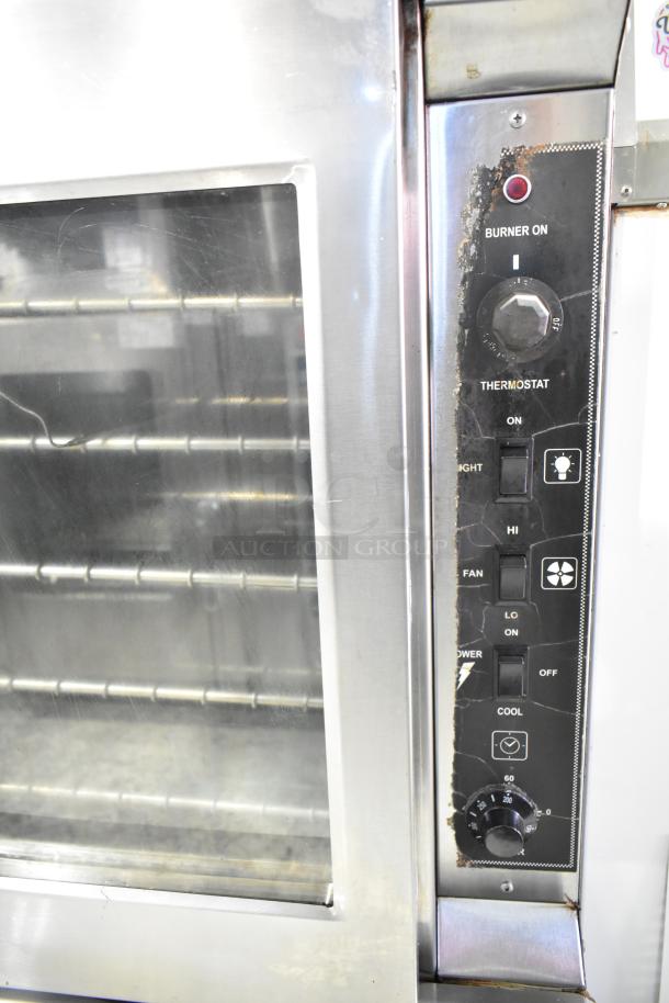 Royal RCOD-1 convection oven, natural gas powered, with view-through door and thermostatic controls. Good condition.