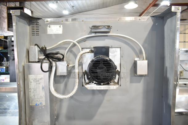 Rear view of Royal RCOD-1 convection oven showing wiring and fan assembly. Includes electrical diagram and plug. Good condition.