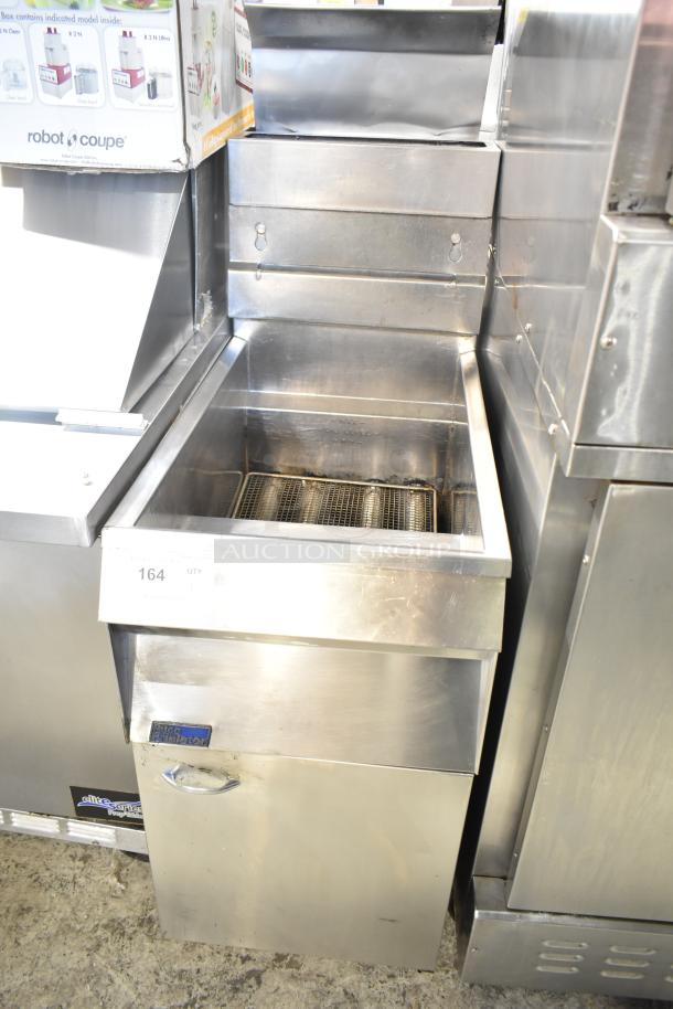 Pitco Frialator commercial gas fryer in stainless steel, floor model, deep fat design, with visible fryer basket.