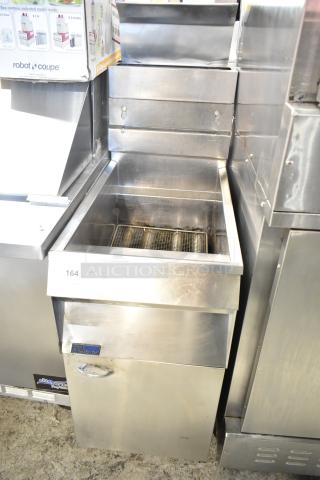 Pitco Frialator commercial gas fryer in stainless steel, floor model, deep fat design, with visible fryer basket.