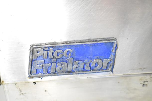 Pitco Frialator commercial gas deep fryer with visible logo, stainless steel finish, used condition, floor model.