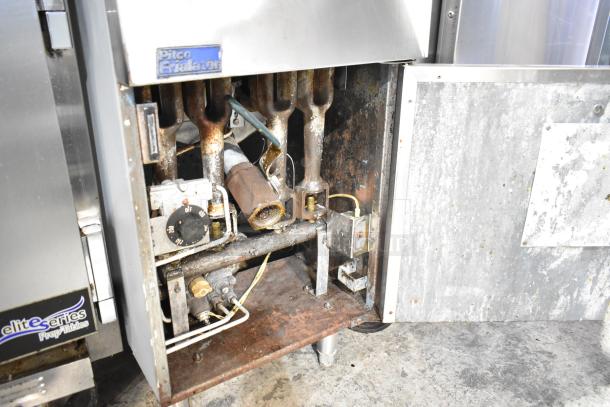 Pitco Frialator commercial gas deep fat fryer, used condition, open panel showing internal components and control dial.