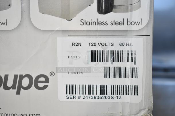 BRAND NEW Robot Coupe R2N Food Processor, 3 Qt gray bowl, 1 hp, 120 volts. Box label shows model, voltage, and barcode.