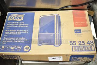 BRAND NEW Tork PeakServe 552548 Black Automatic Paper Towel Dispenser in box, with minor scratches. Model 71255254800.