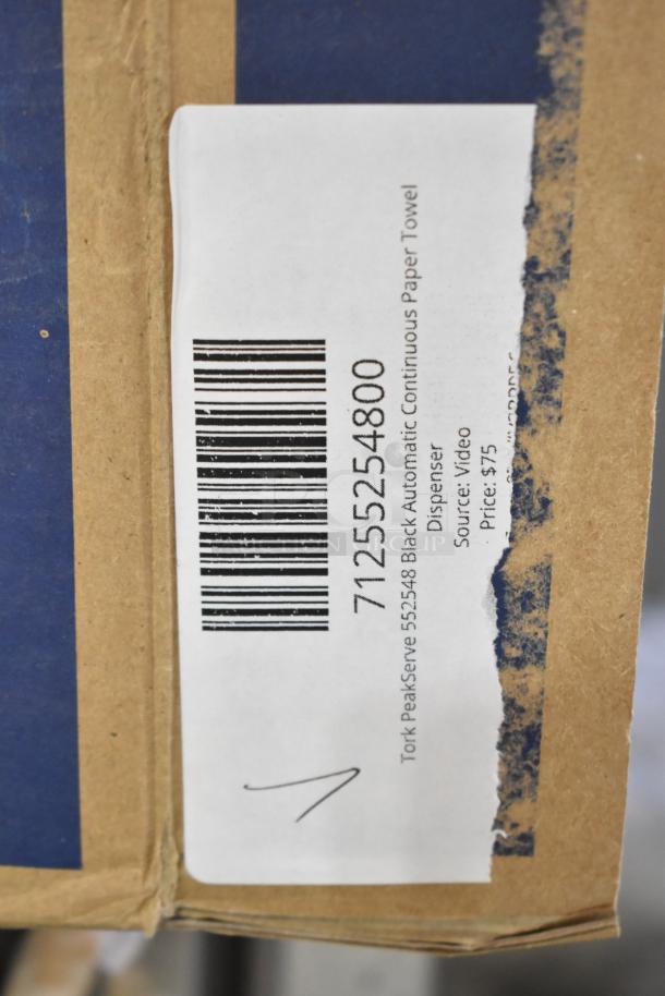 Barcode and label on Tork PeakServe 552548 Black Automatic Continuous Paper Towel Dispenser box, showing model and price.