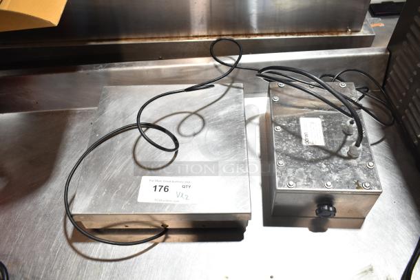 Doran DXL8100 scale base with Doran 7000XLM control head. Stainless steel, visible cables, some surface wear. Auction tag indicates item 176.