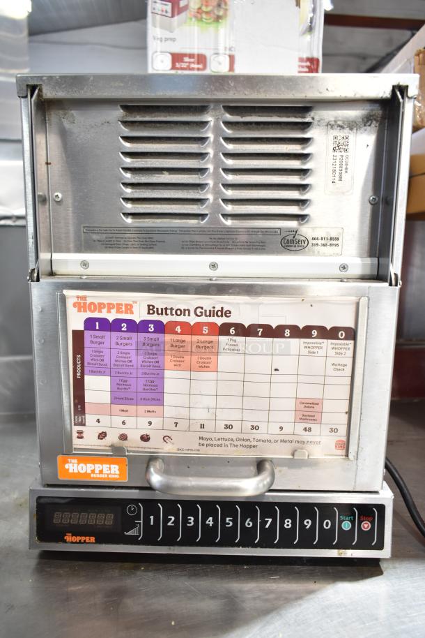 2023 Menumaster OC24HBK Commercial Microwave Oven, 208/240V, features a button guide for various food items, used condition.