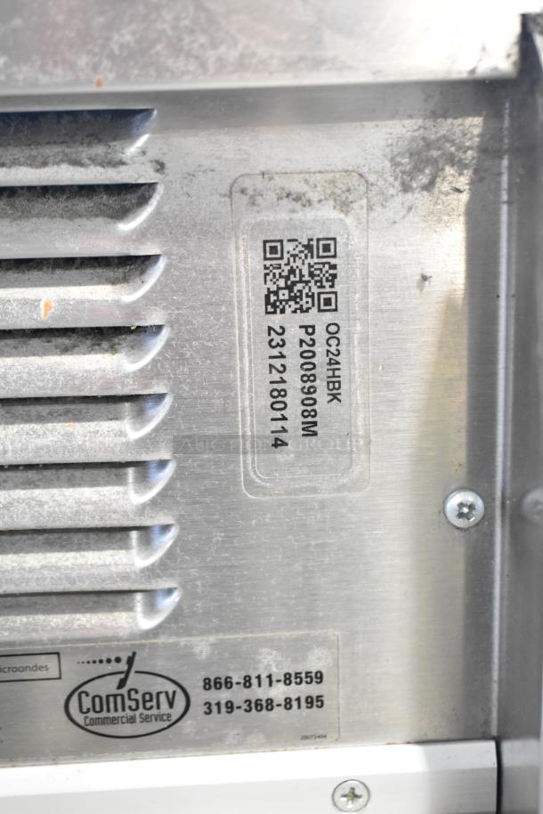 2023 Menumaster OC24HBK Commercial Microwave with visible model label, 208/240V, 1 phase, ComServ contact info.