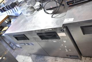 True TUC-48-LP 2 Door Work Top Cooler with Fetco dispensers. Stainless steel, 115V, 1 Phase. Good condition.