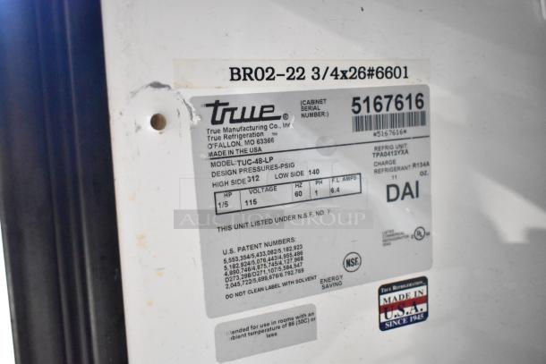 True TUC-48-LP cooler label showing model, design pressures, power specs, NSF certification, and made in USA sticker.