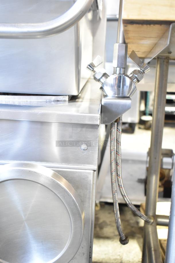 Cleveland commercial floor braising pan, stainless steel, with manual controls and hoses, in good condition.