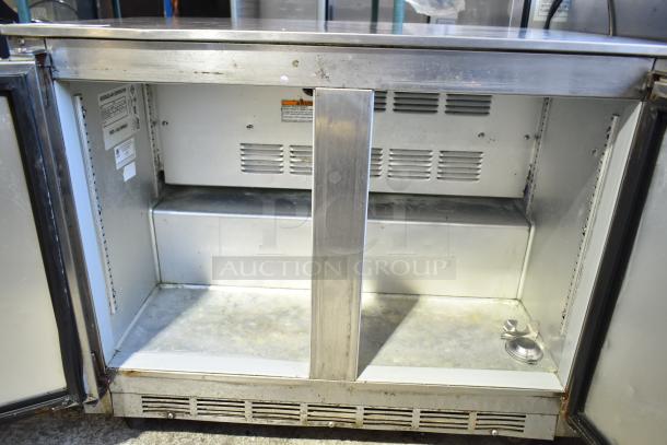 Beverage Air UCR34 undercounter cooler, 2-door, on commercial casters. Stainless steel, 115 volts, 1 phase. Slight wear.