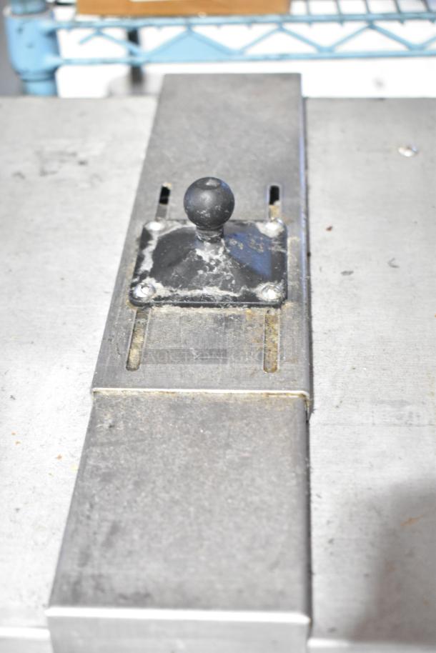 Commercial Countertop Dedicated Holding Bin, stainless steel, used condition with visible wear and a black knob handle.