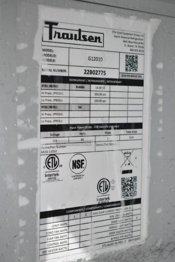 2022 Traulsen G12010 commercial reach-in freezer label; shows model, serial number 22B02775, and certifications.