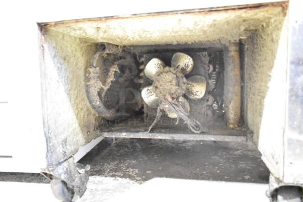 Single Well Prep Station with commercial casters, visible interior fan, showing wear and dust, requires cleaning.