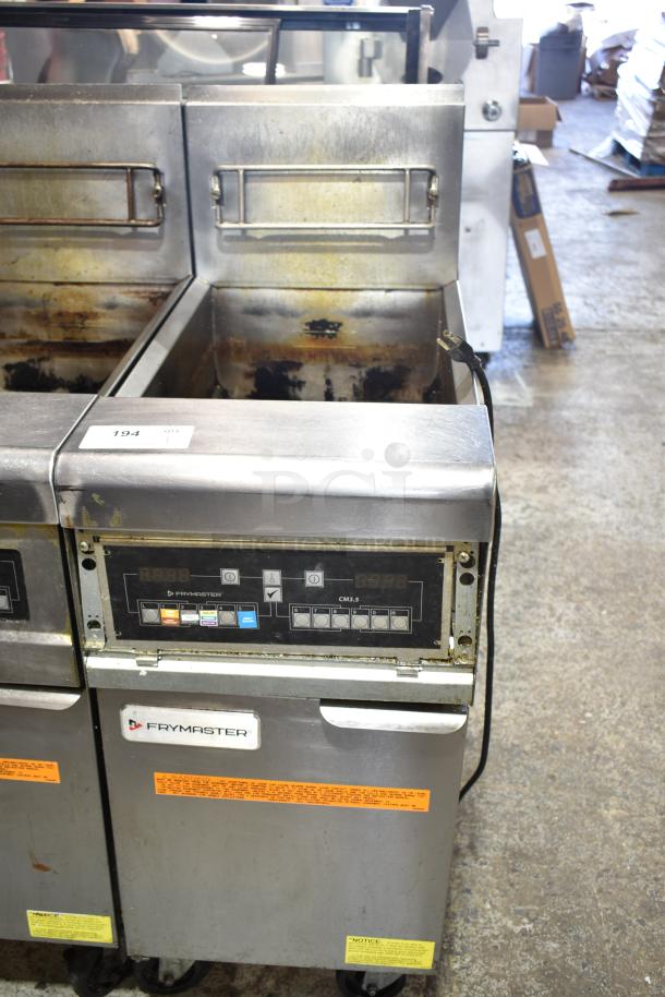 2023 Frymaster PH155CSE commercial fryer, 50 lb. capacity, natural gas, 80,000 BTU, on casters. Slight wear visible.