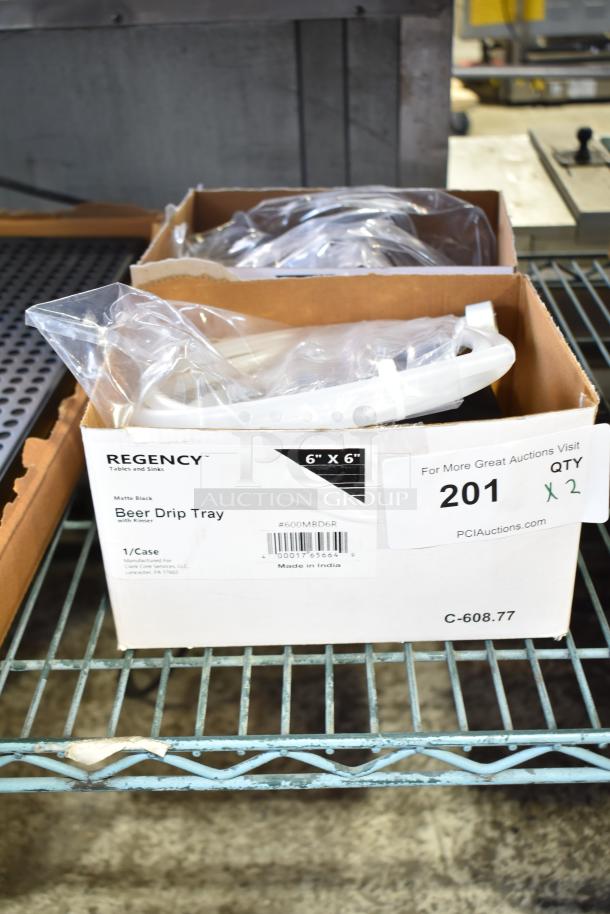 2 brand new Regency 600MBD6R 6"x6" stainless steel black matte surface-mount beer drip trays with rinser in box.