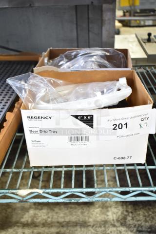 2 brand new Regency 600MBD6R 6"x6" stainless steel black matte surface-mount beer drip trays with rinser in box.