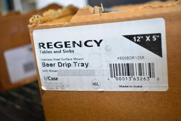 Regency C1621 12"x5" stainless steel surface mount beer drip tray with rinser. Brand new, scratch and dent condition.
