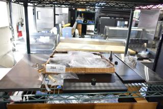 5 new Regency 14"x8" PVD black matte beer drip trays with 4" column cutout. Includes box labeled "204 QTY x5".