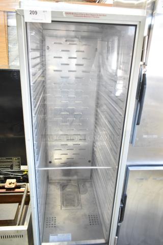 Mainstreet heated holding cabinet on commercial casters, 115 volts, 1 phase. Stainless steel interior, transparent door, label warning.