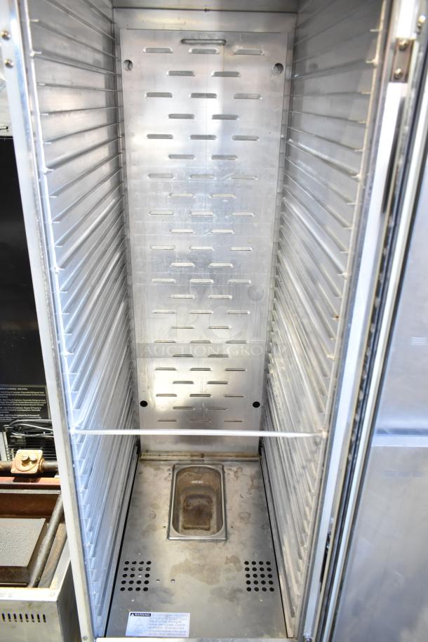 Mainstreet commercial heated holding cabinet with metal interior, on casters. 115 volts, 1 phase. Visible shelf grooves and venting.